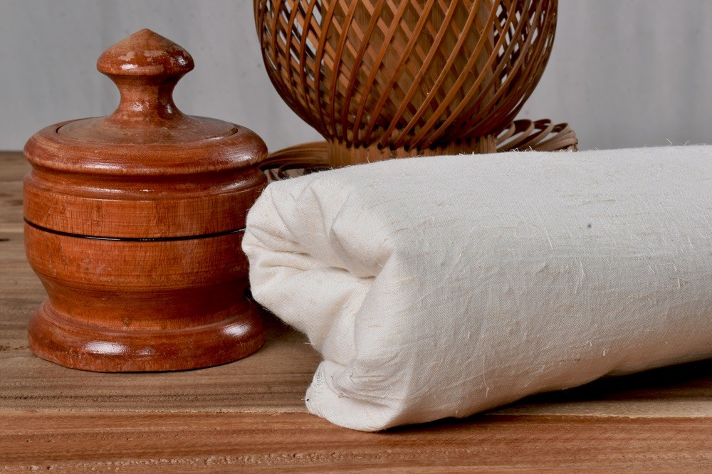 A stack of high-quality, certified sustainable textiles from Buluko