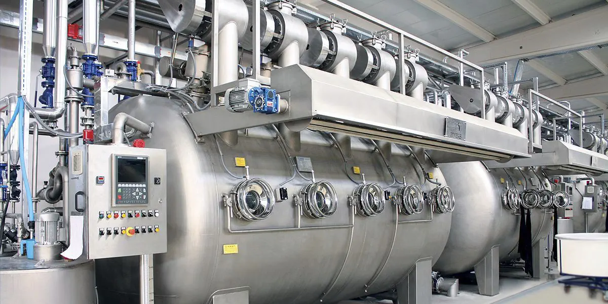 Professional textile dyeing process showing vibrant color application