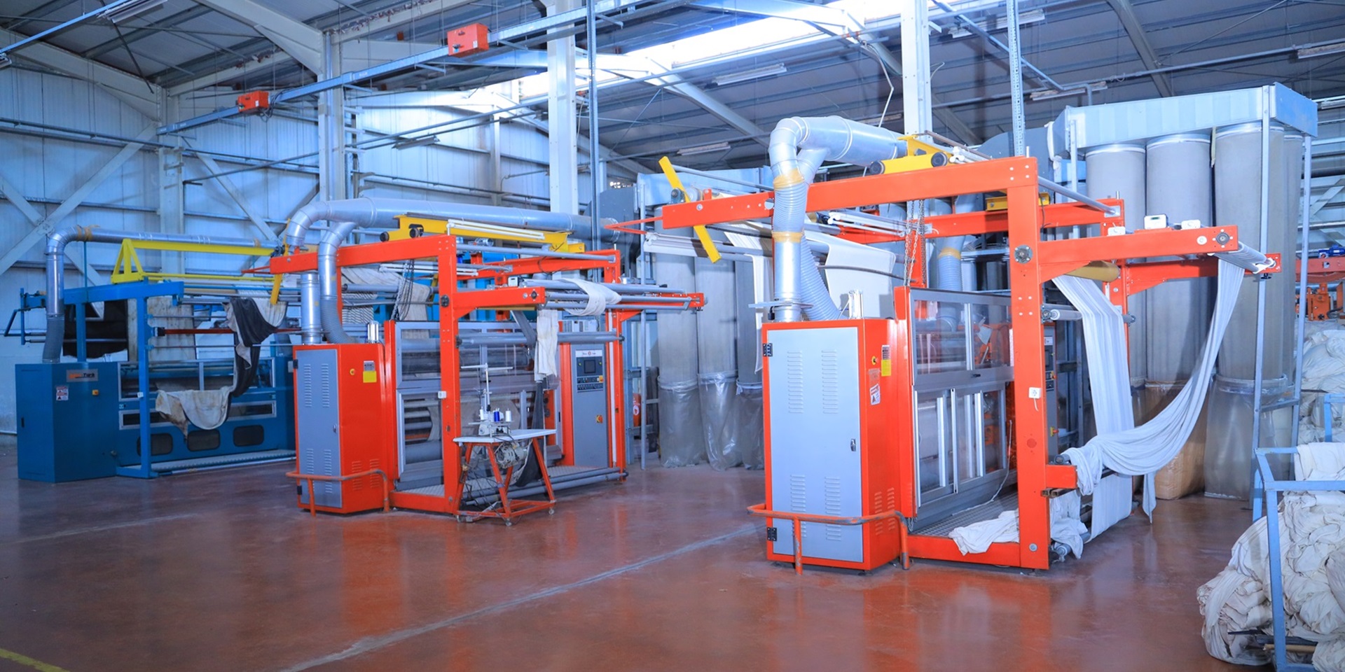 Advanced washing, drying, and initial finishing machinery in operation