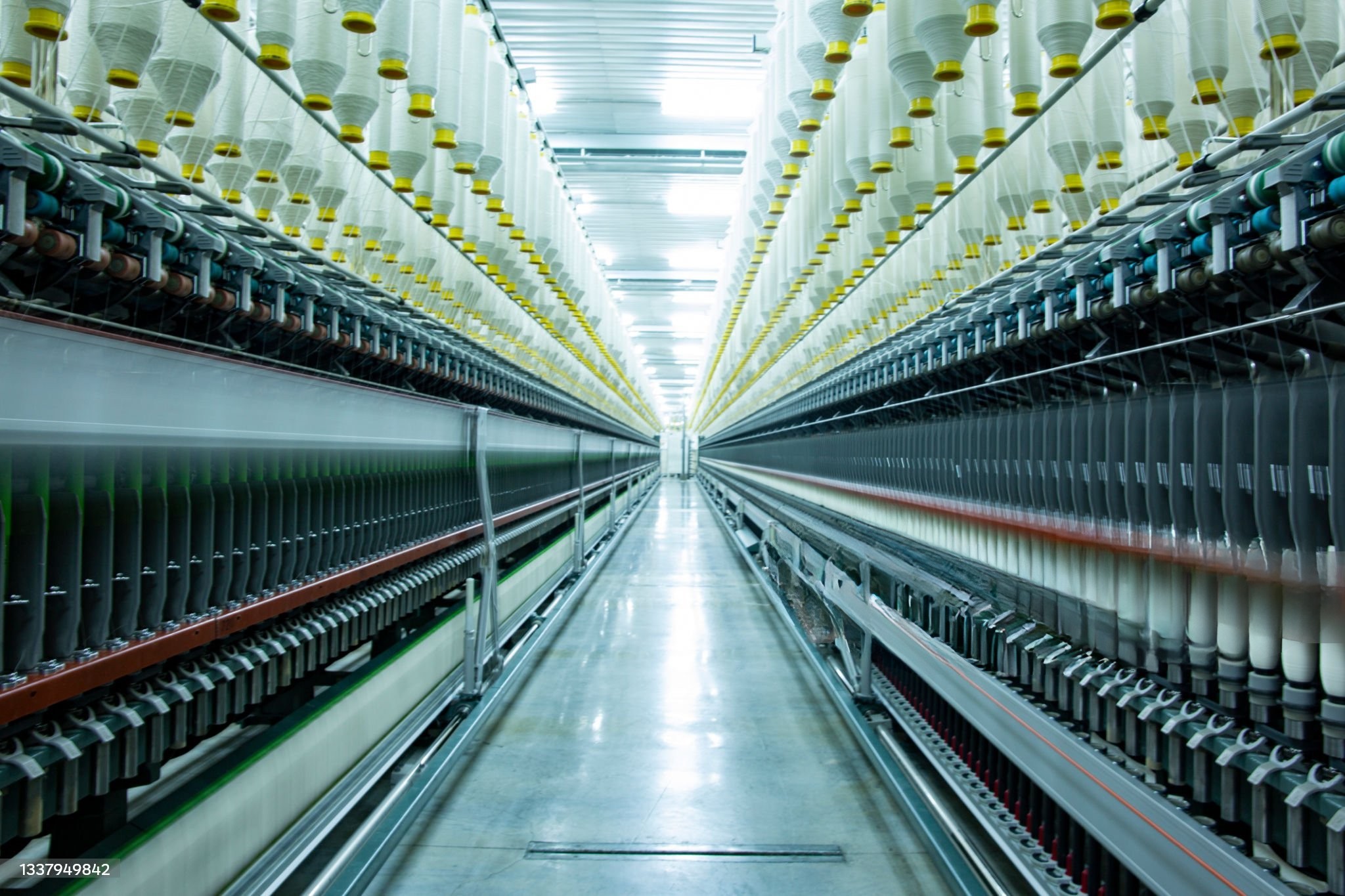 Perfect yarn bobbins showcasing quality control standards
